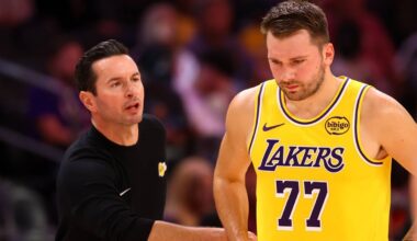 Phoenix, Arizona, USA; Los Angeles Lakers guard Luka Doncic (77) with head coach JJ Redick against the Phoenix Suns during an NBA preseason game at Mortgage Matchup Center. Mandatory Credit: Mark J. Rebilas-Imagn Images