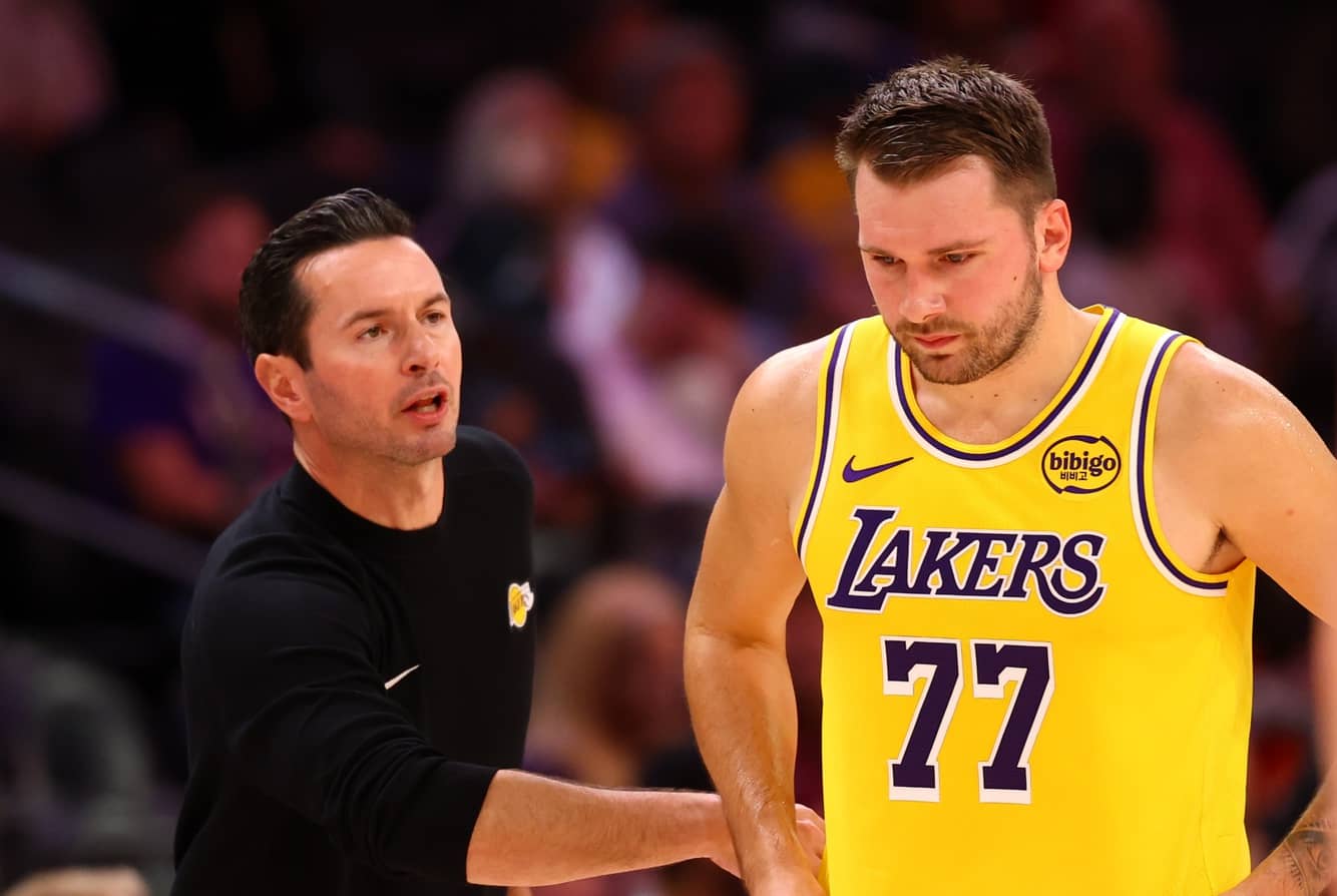 Phoenix, Arizona, USA; Los Angeles Lakers guard Luka Doncic (77) with head coach JJ Redick against the Phoenix Suns during an NBA preseason game at Mortgage Matchup Center. Mandatory Credit: Mark J. Rebilas-Imagn Images