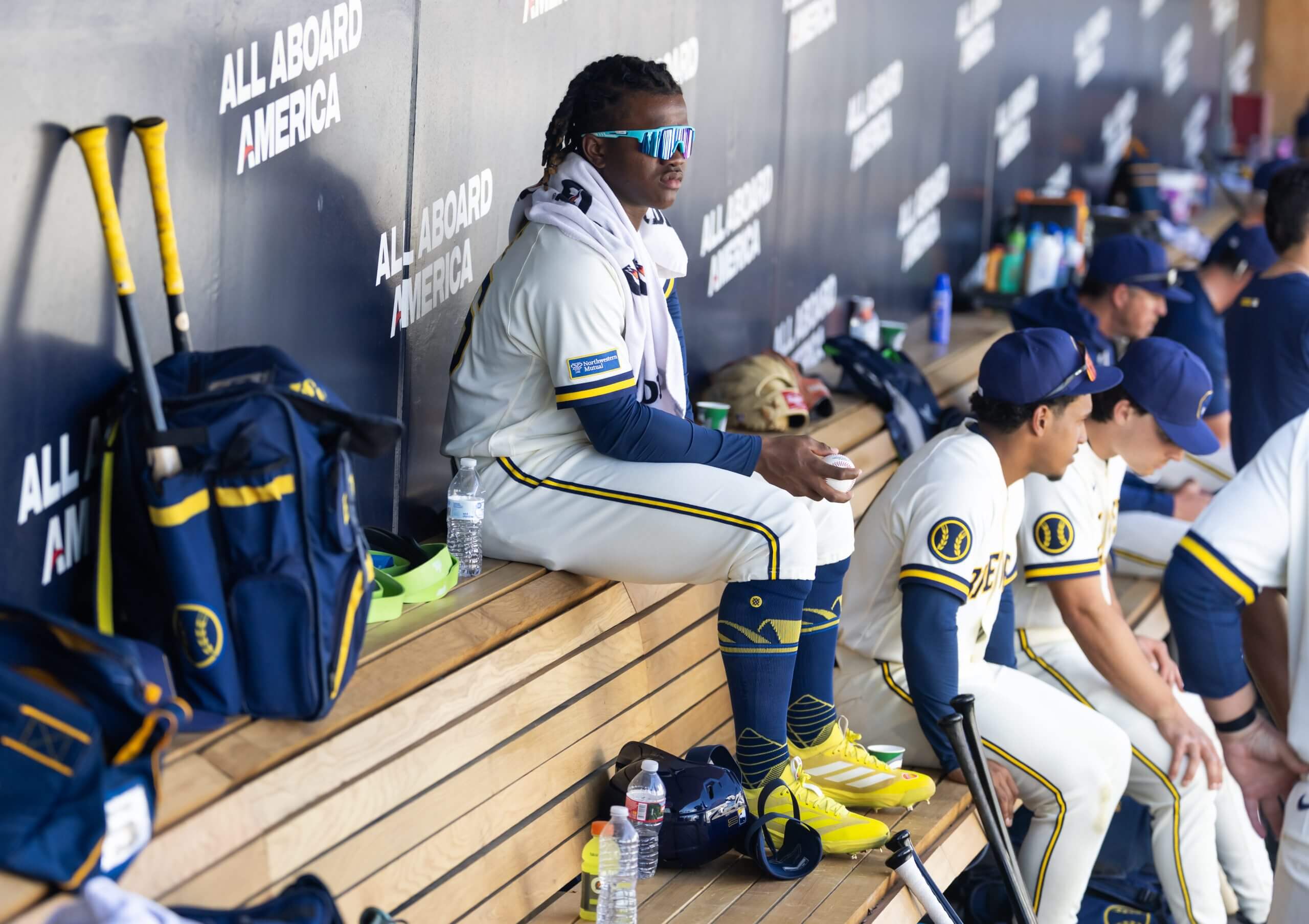 Milwaukee Brewers infielder Jesus Made sits in the dugout against the Chicago White Sox during a spring training game at American Family Fields of Phoenix.
