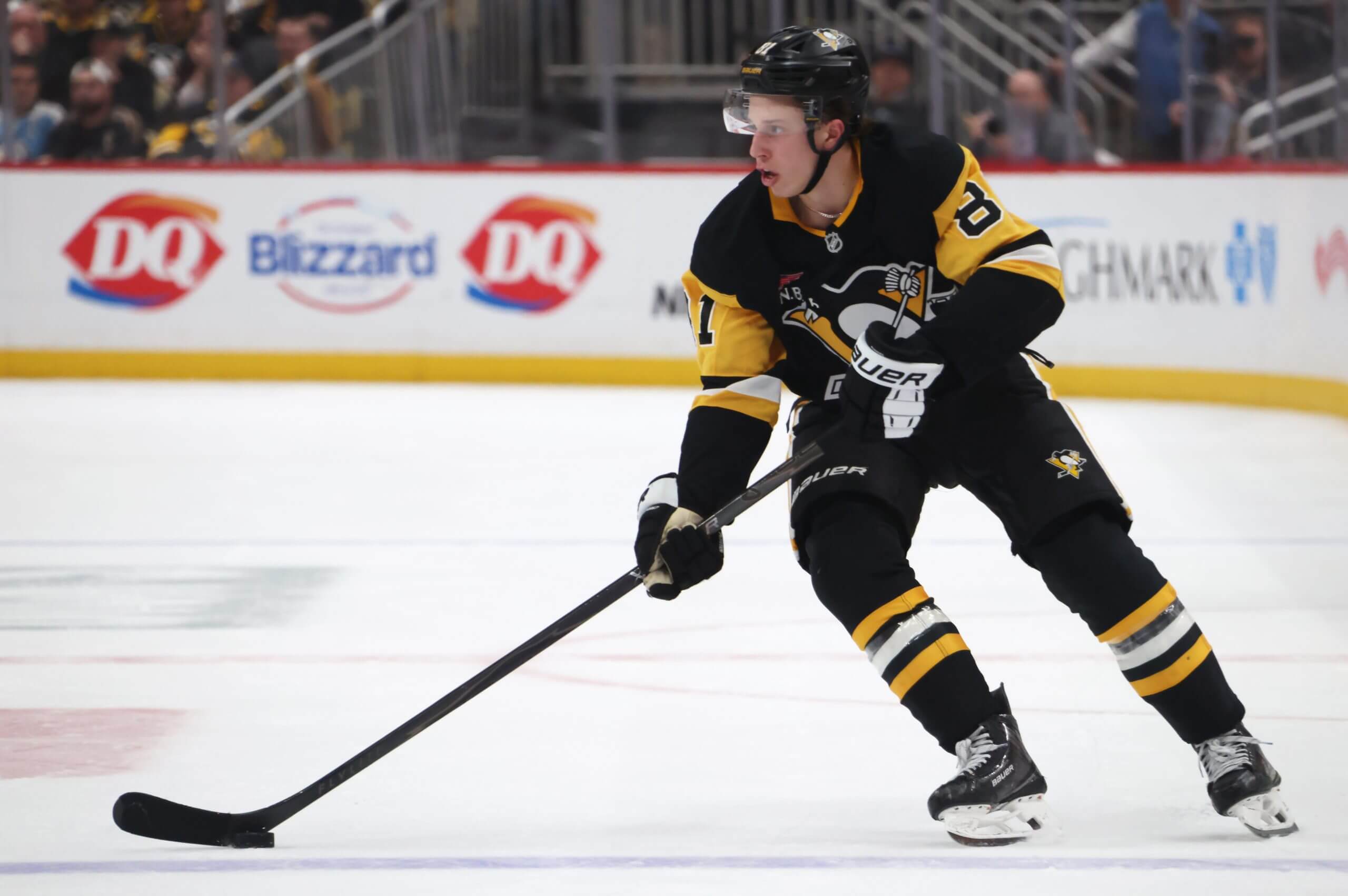 Ben Kindel skates with the puck during a Penguins game.