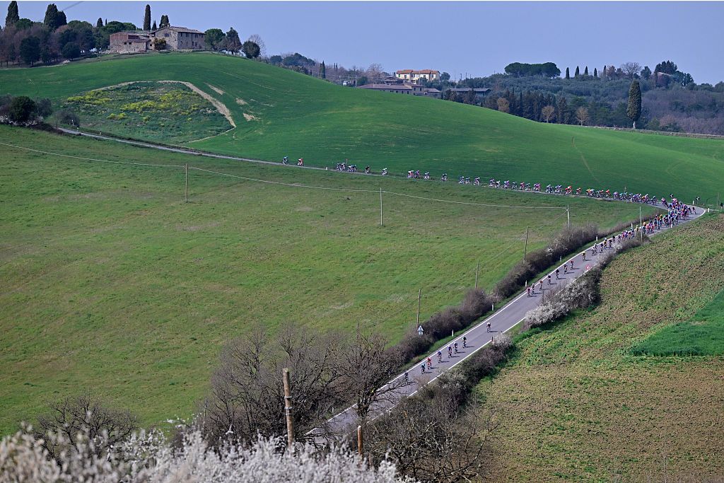 The pack of riders pictured in action during the men elite 'Strade Bianche' one day cycling race, 203km from and to Siena, Italy on Saturday 07 March 2026. BELGA PHOTO DIRK WAEM (Photo by DIRK WAEM / BELGA MAG / Belga via AFP)