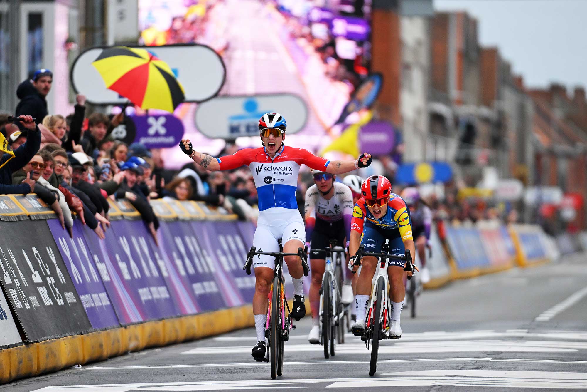 WEVELGEM, BELGIUM - MARCH 29: (L-R) Lorena Wiebes of Netherlands and Team SD Worx - Protime celebrates at finish line as race winner ahead of Fleur Moors of Belgium and Team Lidl - Trek during 13th In Flanders Fields - From Middelkerke to Wevelgem 2026 - Women's Elite a 135.2km one day race from Wevelgem to Wevelgem / #UCIWWT / on March 29, 2026 in Wevelgem, Belgium. (Photo by Tim de Waele/Getty Images)