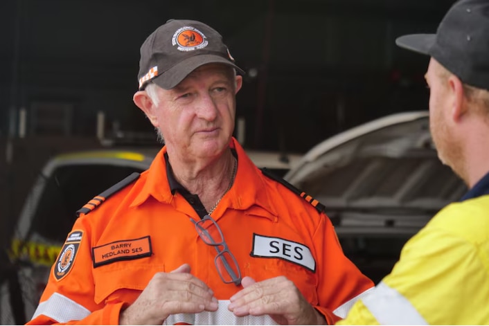 An older man in SES uniform.