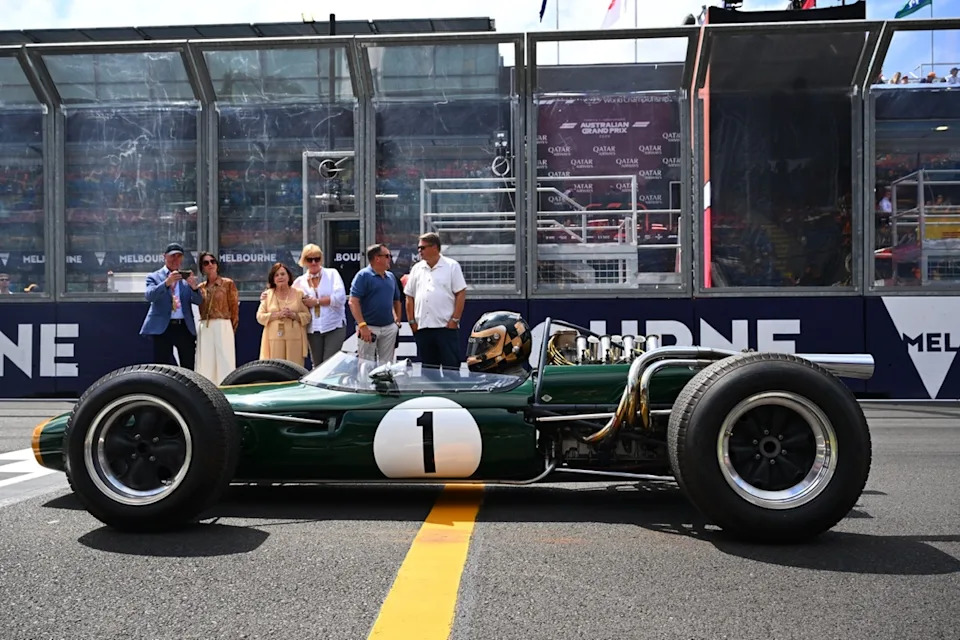 Sam Brabham drives a Brabham BT-19 on track