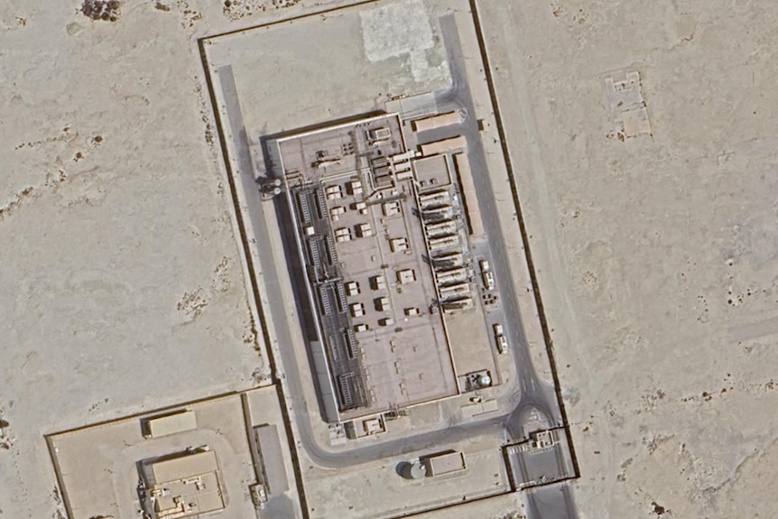 A satellite image of a data center in the desert.