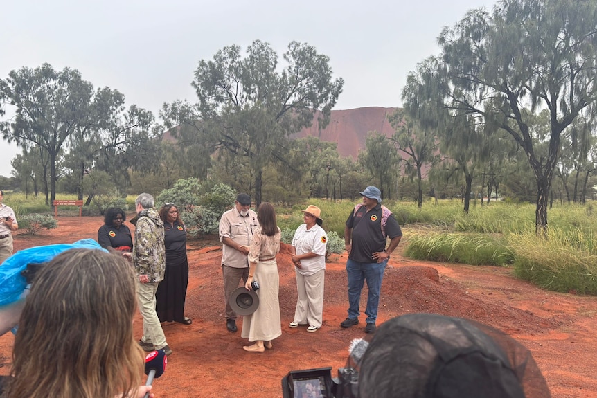 Queen Mary and King Frederik X shake hands with traditional owners at Uluru Kata Tjuṯa Cultural Centre