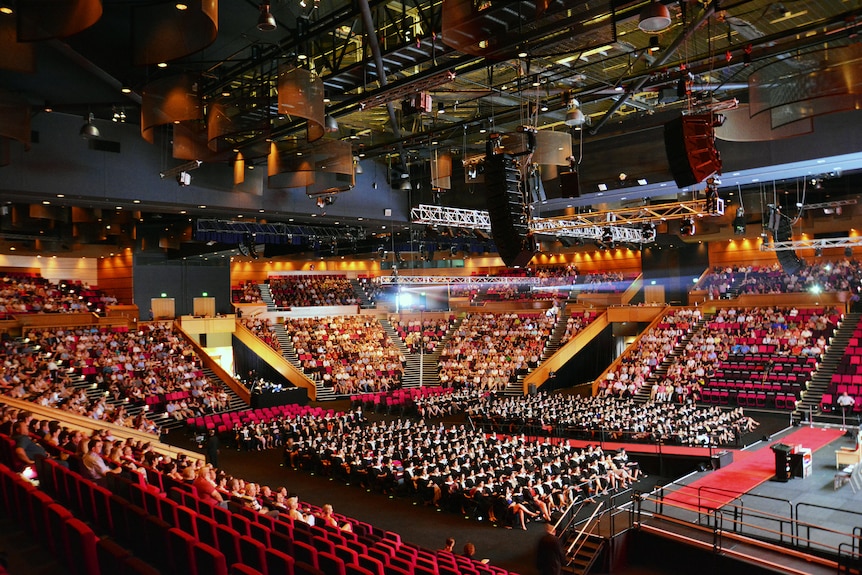 Large hall with seating and stage at front