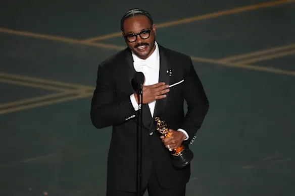 Ryan Coogler accepts the award for writing (original screenplay) for Sinners.