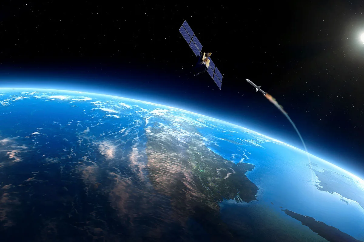 Artwork depicting space warfare. A missile, launched from a ground station, is seen approaching a satellite in orbit above the Earth.
