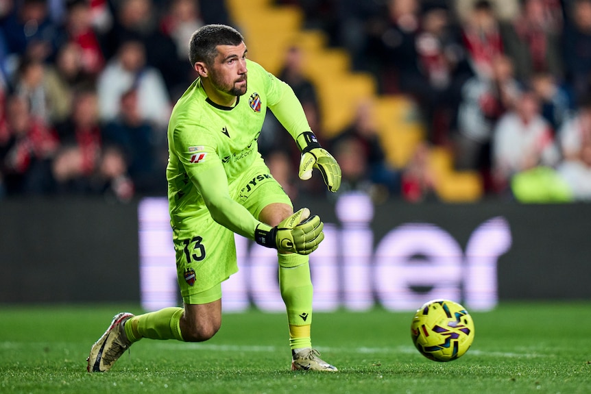 Levante goalkeeper Mat Ryan releases a ball on the ground