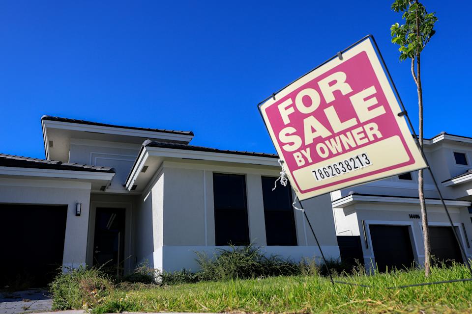 MIAMI, FLORIDA - AUGUST 01: A 'for sale' sign sits in front of a single family home on August 01, 2025 in Miami, Florida. Home sales have fallen across South Florida as high interest rates and other factors have weighed on the market. (Photo by Joe Raedle/Getty Images)