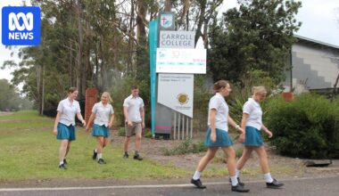 Students at coastal secondary college get ready to walk to school for the first time