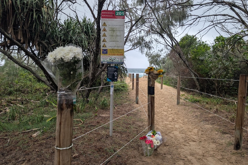 Flowers were left at Buddina Beach where Joe Tolano died. 