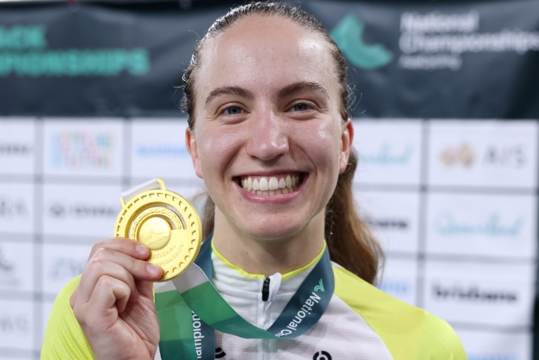 Sophie Edwards holds a medal