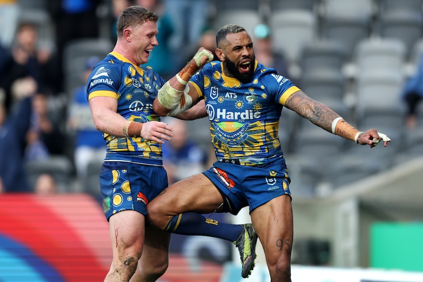Josh Addo-Carr does an Indigenous dance during an NRL game.