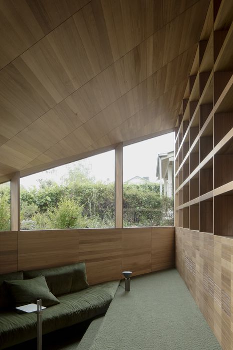 The street-facing living space is slightly sunken for a more intimate setting.