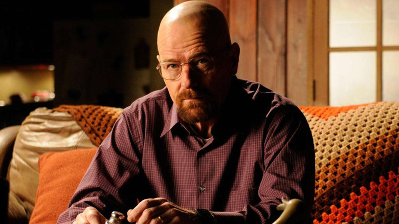 Walter White (Bryan Cranston) sitting on a sofa on 
