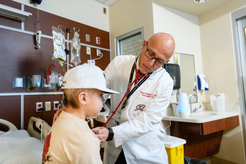 Dr. Mohamad Al-Rahawan treats Angel Hernandez of Carlsbad, New Mexico, at Texas Tech University Health Sciences Center in Lubbock, Texas.