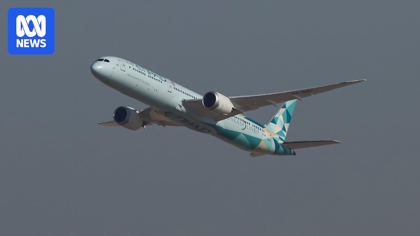 Travellers sleep at airport amid warning of 'significant disruptions' from Middle East conflict