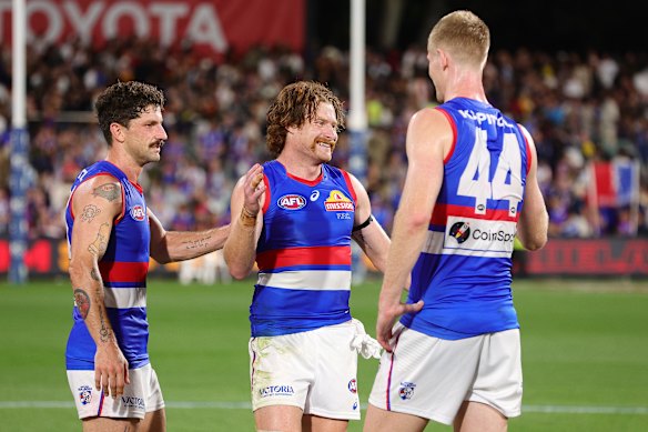 Tom Liberatore, Oskar Baker and Tim English after the Bulldogs’ win over the Crows in Adelaide.