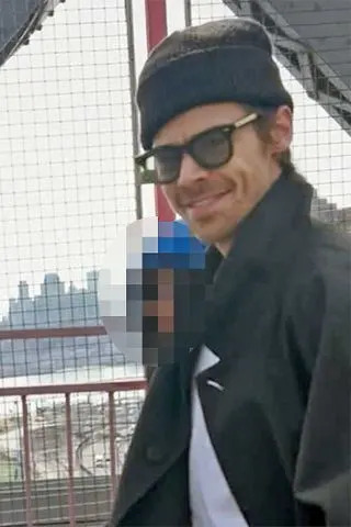 Harry Styles walking on the bridgeCredit: Julia Parker