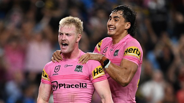 Thomas Jenkins celebrates a try for the Penrith Panthers against the Sydney Roosters.