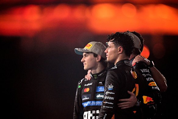 Oscar Piastri, Max Verstappen (obscured) and Lando Norris after the F1 season finale last year.
