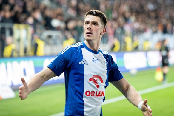 Deni Juric celebrates a goal for Wisla Plock.