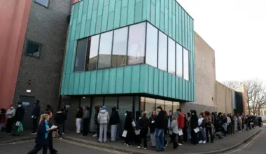 People, mainly students, queueing to receive Meningitis B vaccinations at a sports centre on the University of Kent campus on March 20, following an outbreak in Kent.
