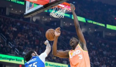 Cleveland Cavaliers center Thomas Bryant (3) dunks over Orlando Magic center Goga Bitadze (35) in the first half of an NBA basketball game in Cleveland, Tuesday, March 24, 2026. (AP Photo/Sue Ogrocki)