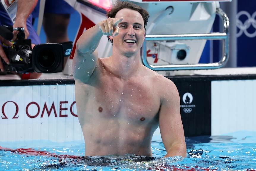 Cameron McEvoy points his finger after winning gold at the Paris Olympics.