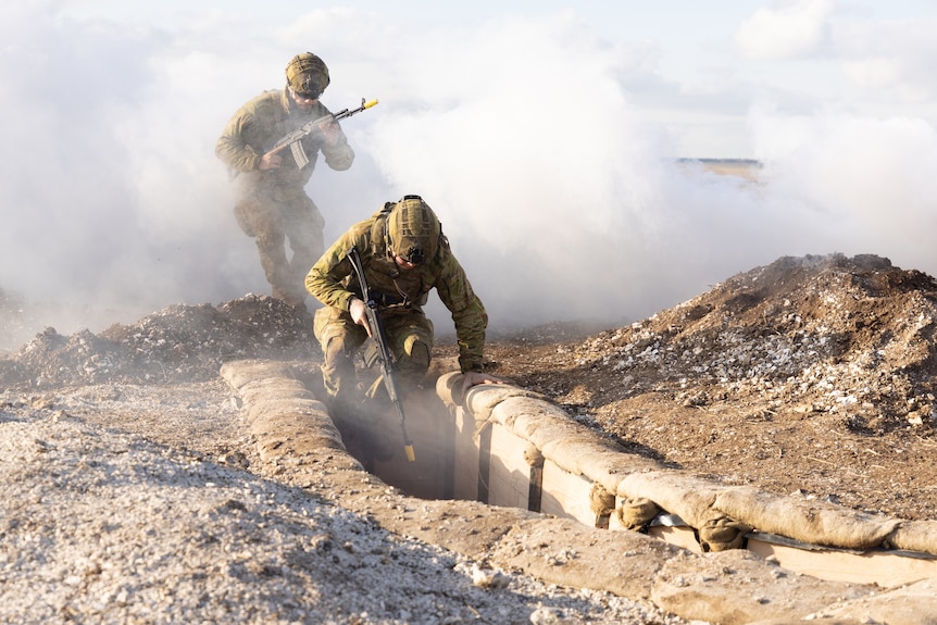 Australian soldiers in a trench.