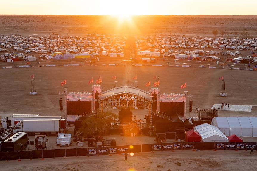 stage in front of caravans