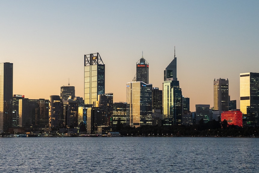 Skyscrapers in the background with the Swan River in the foreground.