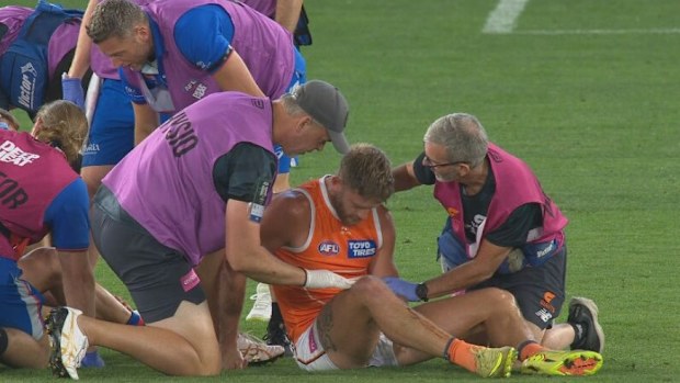 Jayden Laverde in pain after the collision. 