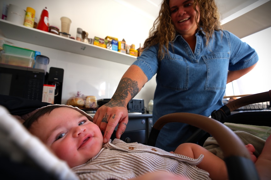 Mum and bub smiling together