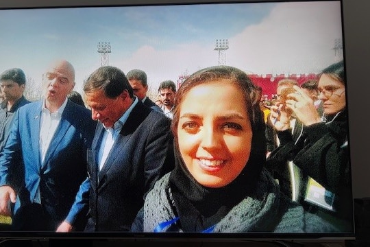 A lady wearing a chador in Iran.