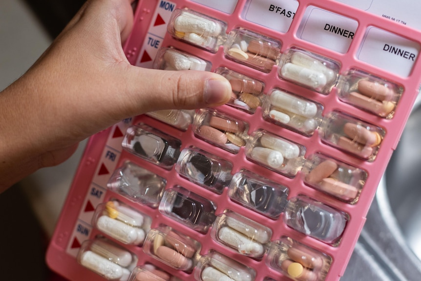 A pink webster pack of medication.