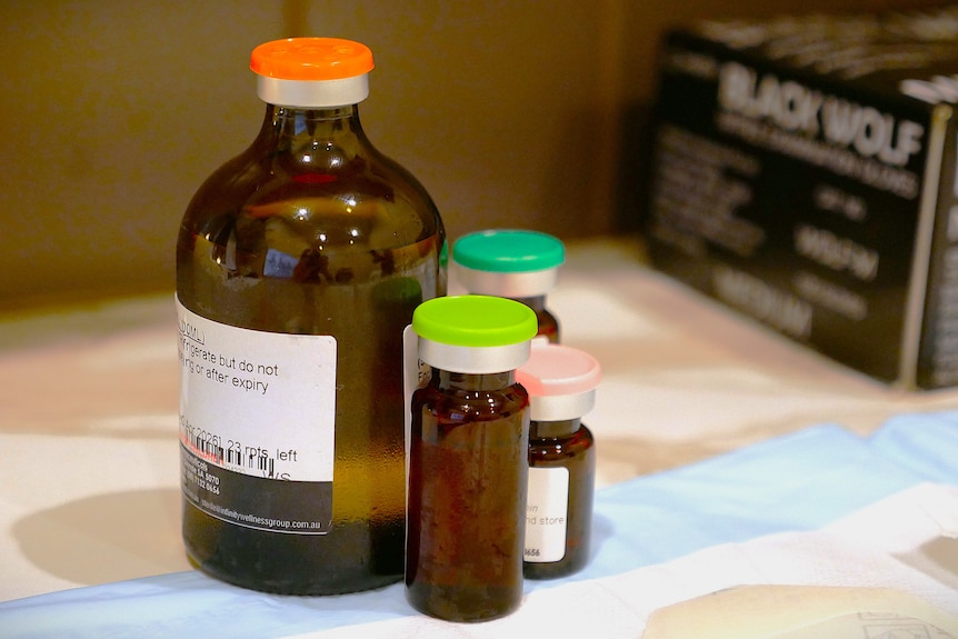 A cluster of brown glass bottles.