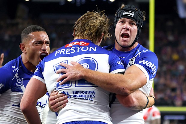 Matt Burton and Jacob Preston embrace during the Bulldogs' win in Las Vegas.