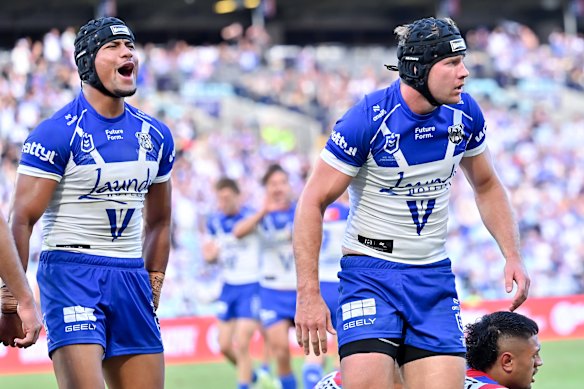 Stephen Crichton and Matt Burton celebrate a Bulldogs try. 