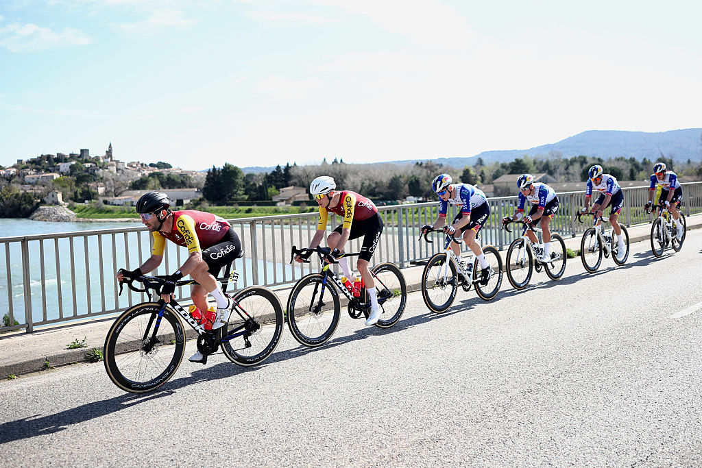 Cofidis' French rider Benjamin Thomas leads the pack during the 6th stage of the Paris-Nice cycling race, 179.3 km between Barbentane and Apt, on March 13, 2026. (Photo by Anne-Christine POUJOULAT / AFP)