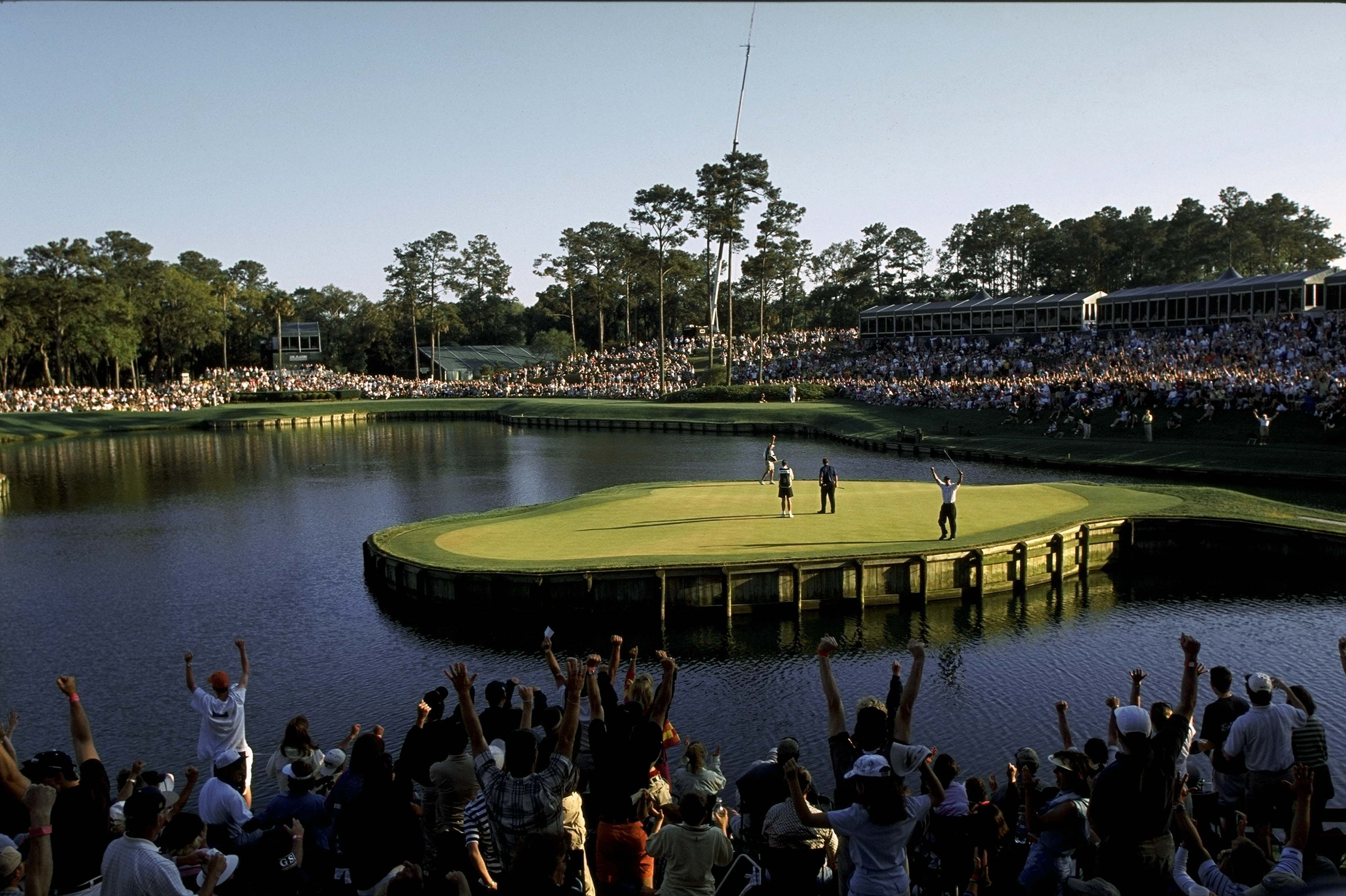 PONTE VEDRA BEACH, FLORIDA - MARCH 24: Tiger Woods celebrates making his &ldquo;Better than most&rdquo; putt at the 17th hole during the third round of The PLAYERS Championship at the TPC Stadium course on March 24, 2001 in Ponte Vedra Beach, Florida. (Photo by Chris Condon/PGA TOUR via Getty Images)