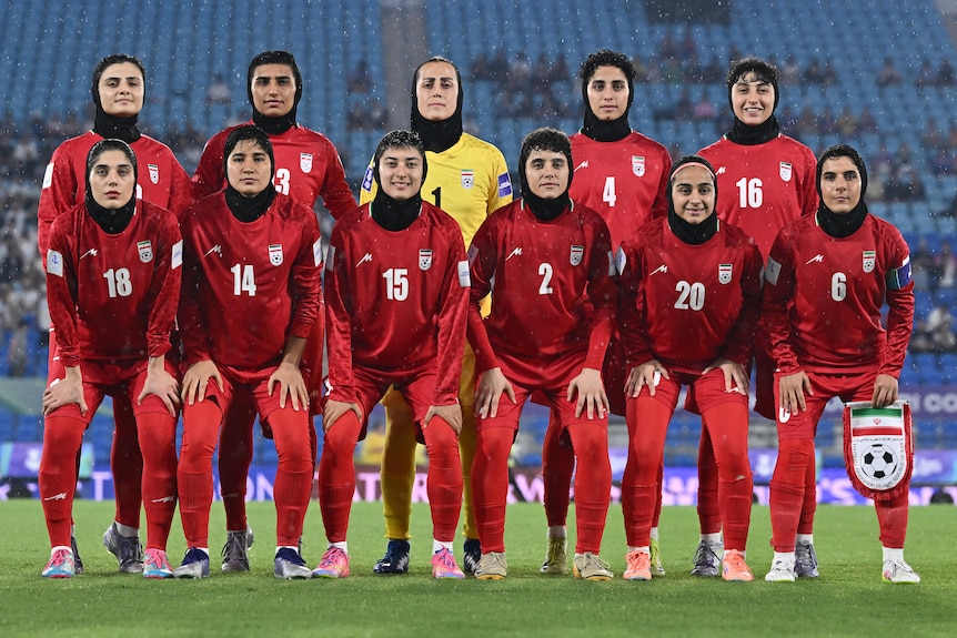 A team shot of the Iranian women's football team ahead of a match at the Women's Asian Cup.