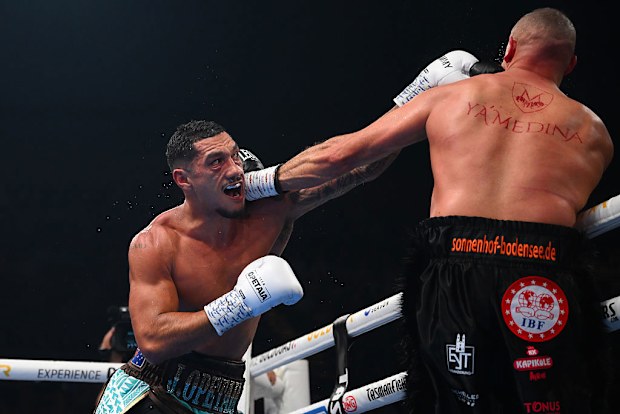 Jai Opetaia punches Huseyin Cinkara during the IBF & Ring Magazine Cruiserweight World Title bout.