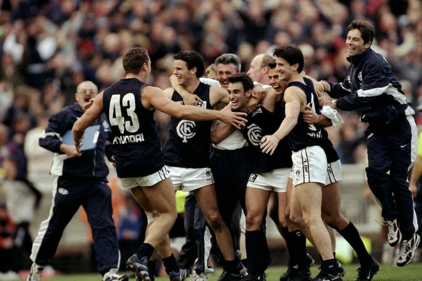 Carlton players celebrate after 1999 preliminary final win