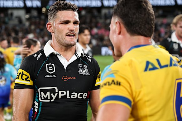 Nathan Cleary talks with Mitchell Moses at fulltime.