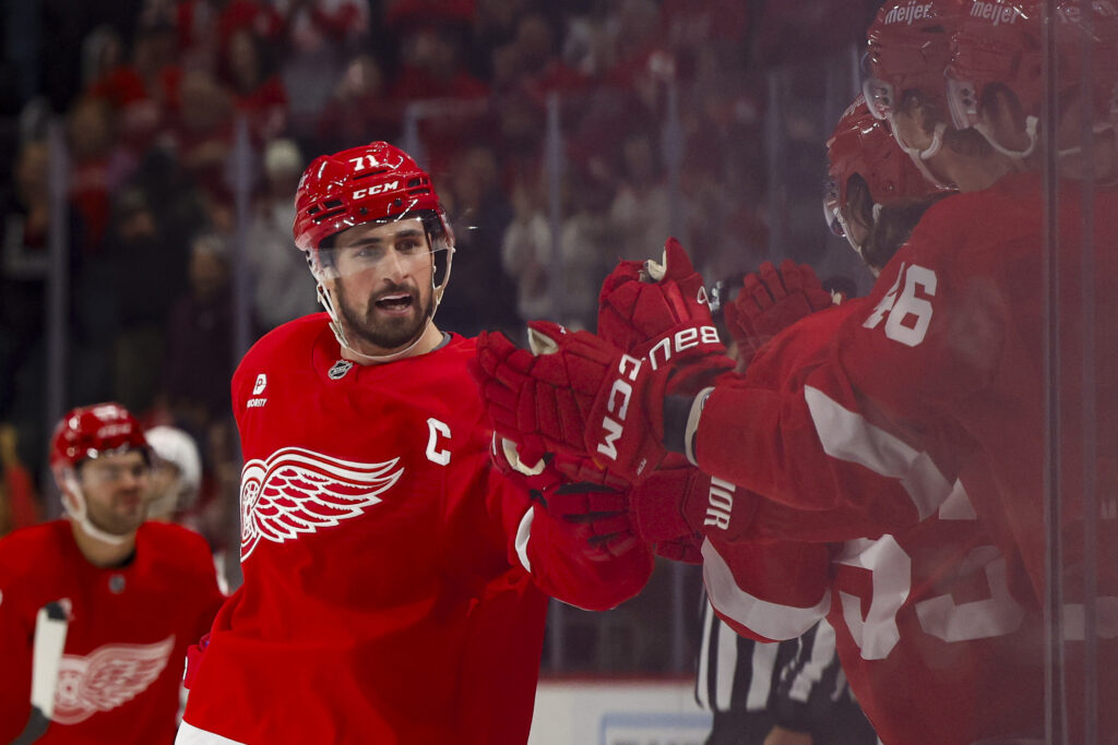 Red Wings center Dylan Larkin (71) receives congratulations