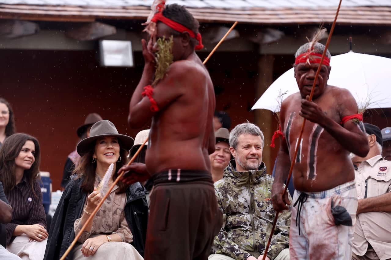 Two performers doing a traditional song and dance
