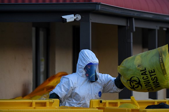 A clinical waste removalist at St Basil’s during the aged care home’s COVID outbreak in 2020.